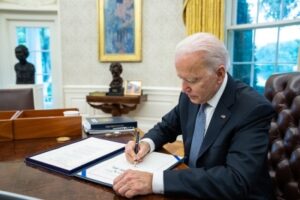 Biden signs executive order to curb unlawful border crossings by immigrants