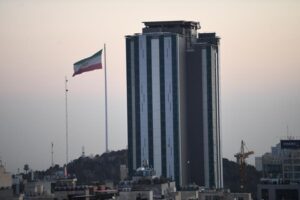 Iran reports ‘successful’ drone mission as US says it shot down aircraft near carrier