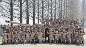 North Korea’s Kim oversees artillery firing contest on state founder’s birthday