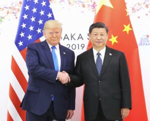 Trump faces pressure to confront China on rights, trade ahead of meeting with Xi