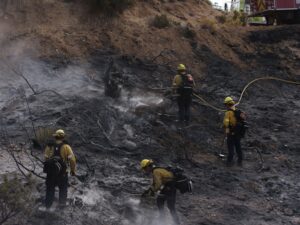 Fast-growing wildfire near US Nevada-California border injures 6, forces 42,000 to evacuate
